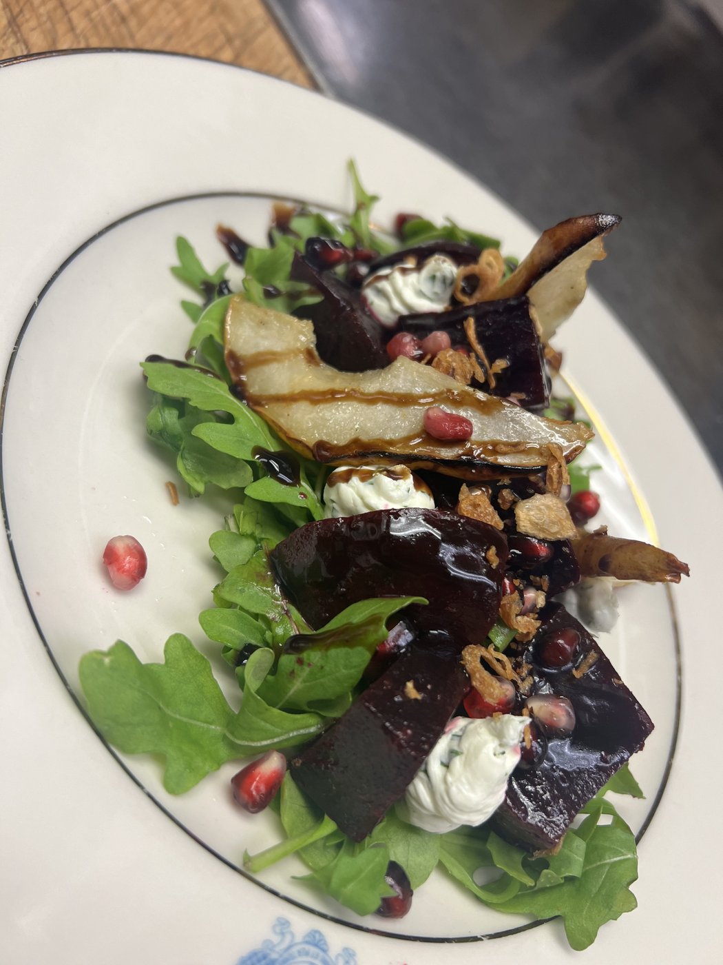 Pear, greens and pomegranate salad